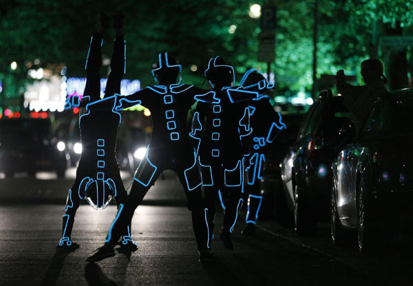Dancers on Berlin Lights display