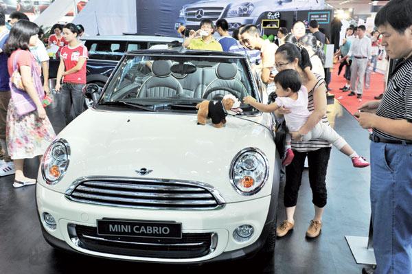 Luxury-car makers go for compacts