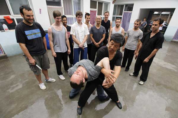 Martial arts master instructs foreigners