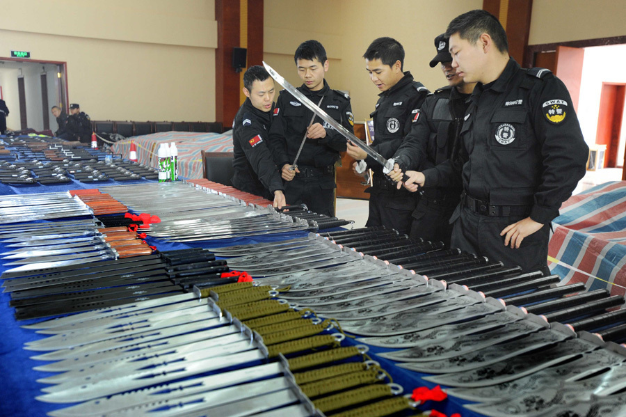 Record number of guns, knives seized in raid