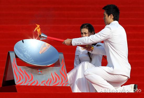 Guangzhou Para-Asian Games flame lit in Beijing