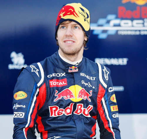 F1 champion Vettel signs new deal with Red Bull