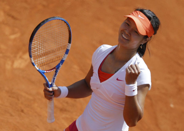 China's Li Na reaches 2nd round at French Open