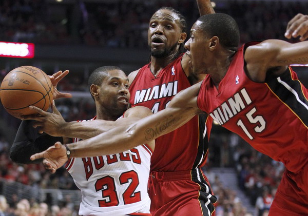 James, Wade lead charge as Heat eliminate Bulls