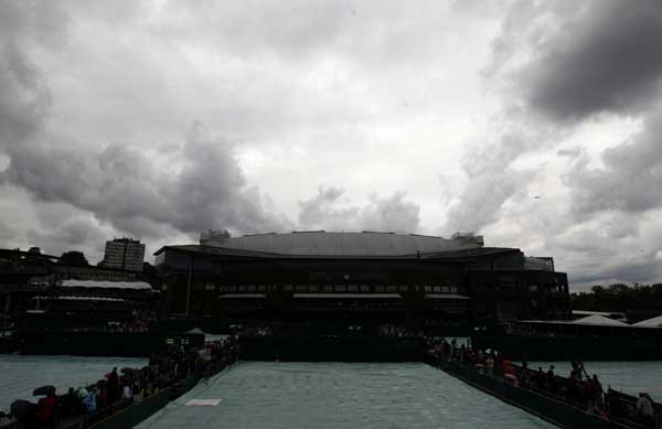 Rain soaks opening day at Wimbledon