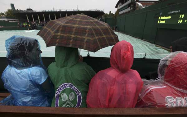 Rain soaks opening day at Wimbledon