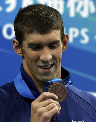 Phelps off to losing start at worlds