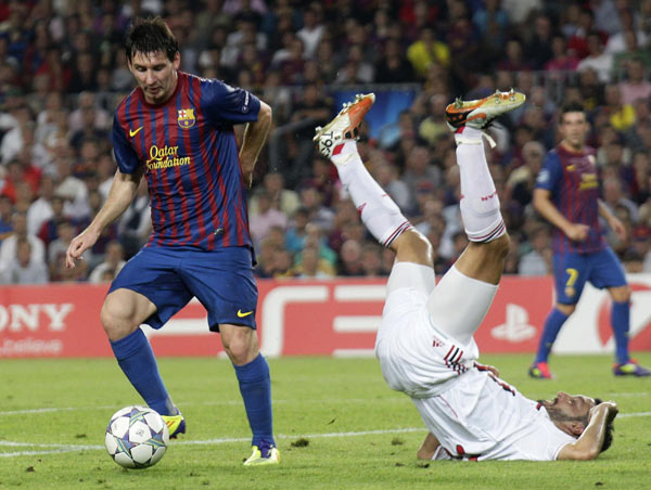 AC Milan snatch 2-2 draw at holders Barcelona