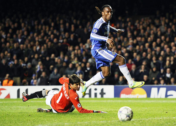 Inspired Drogba leads Chelsea into last 16