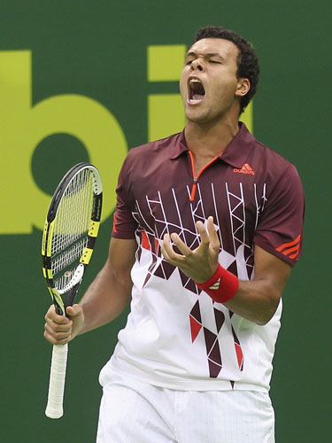 Rampant Federer crushes Davydenko in Doha