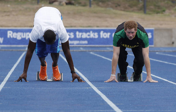 Prince Harry runs with Usain Bolt in Jamaica