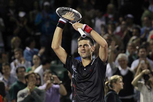 Djokovic downs feisty Ferrer, to meet Monaco