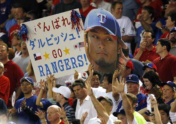 Darvish roughed up, but wins MLB debut