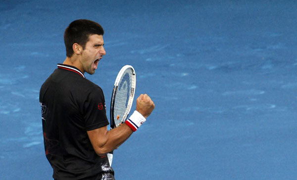 Djokovic slams blue clay after Madrid opener win