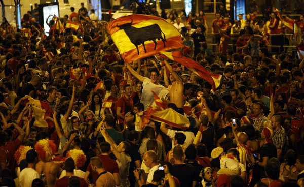 Spain basks in soccer glory despite ailing economy