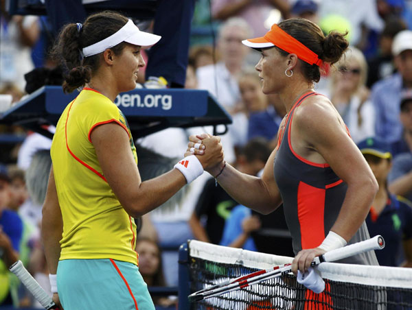 Defending champ Stosur ends Robson's run