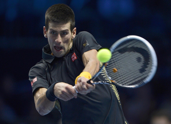 Djokovic fights back to beat Murray at Tour Finals