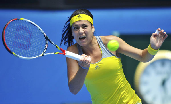 Li Na reaches Australian Open last 16 in four straight years