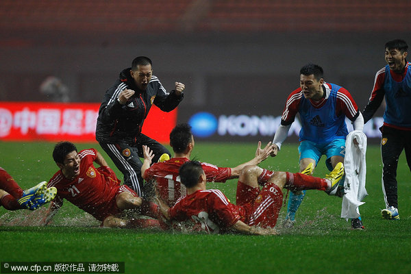 China leads Iraq 1-0 in 2015 Asian Cup qualifier
