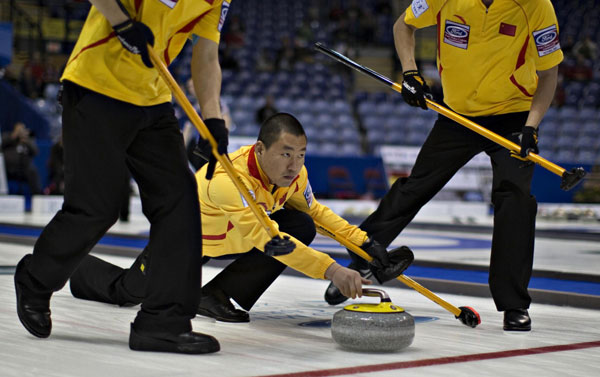 China posts split in opening matches of men's world curling championship