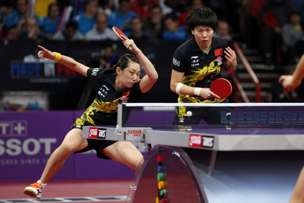 Li Xiaoxia adds doubles title to singles win at table tennis worlds