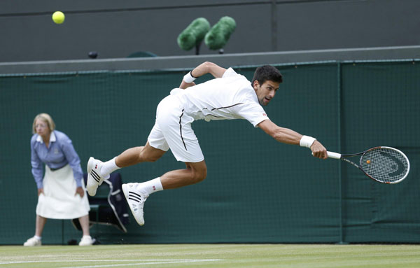 Djokovic, Murray reach semifinal at Wimbledon