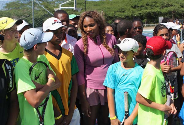 Williams sisiter, Olympic sprinters join in tennis clinic