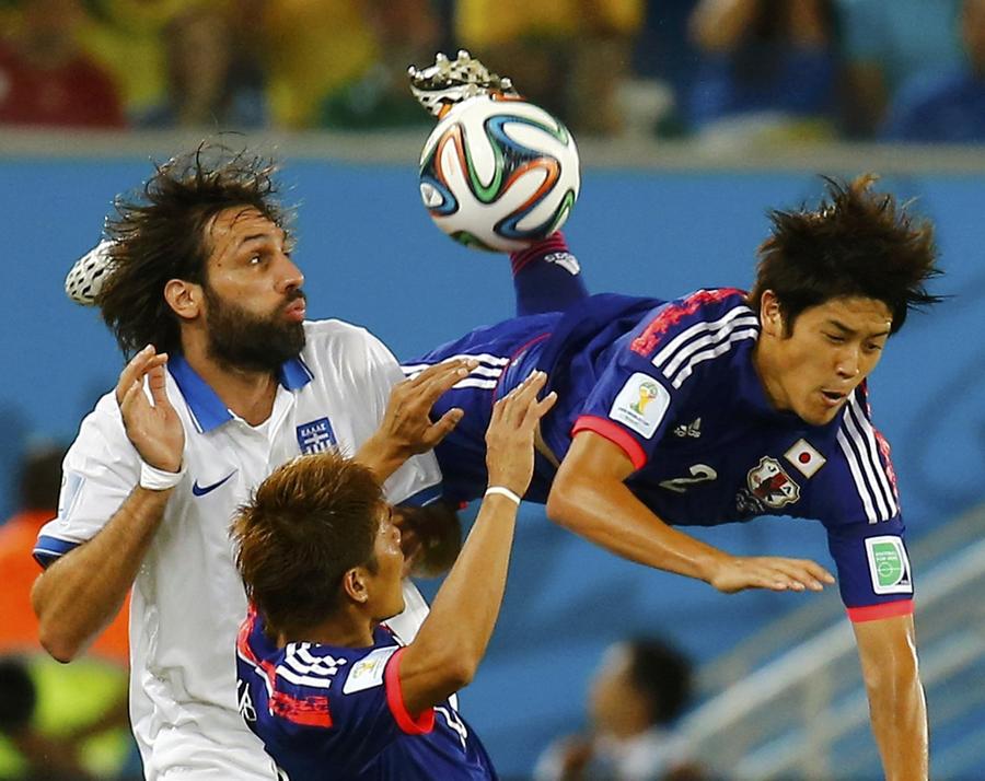 Scoreless draw keeps Japan and Greece alive