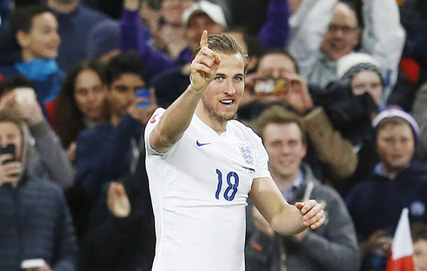 Kane scores on debut as England thrash Lithuania