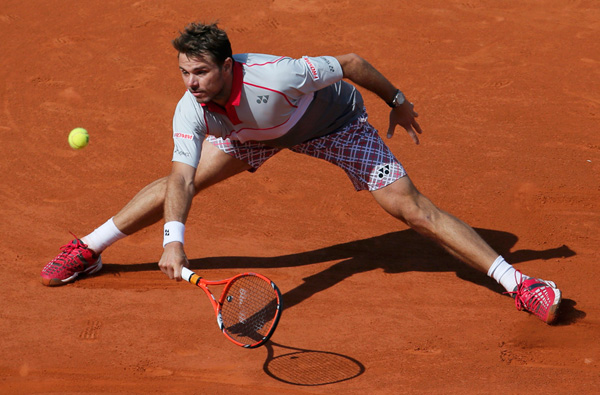 Inspired Wawrinka tames Djokovic to win French Open