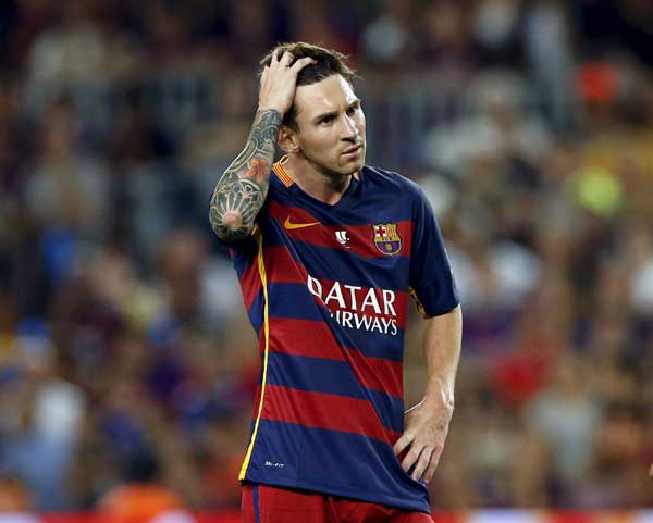 Barca's Messi, father face trial on tax fraud charges