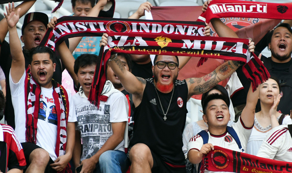 Chinese group agrees to take higher initial stake in AC Milan