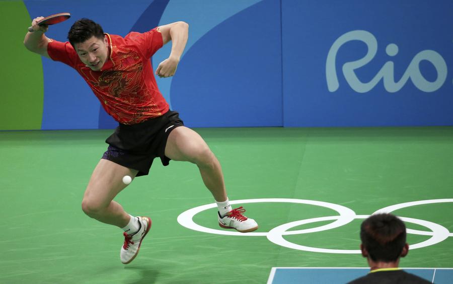Ma Long wins Chinese derby to edge defending champion