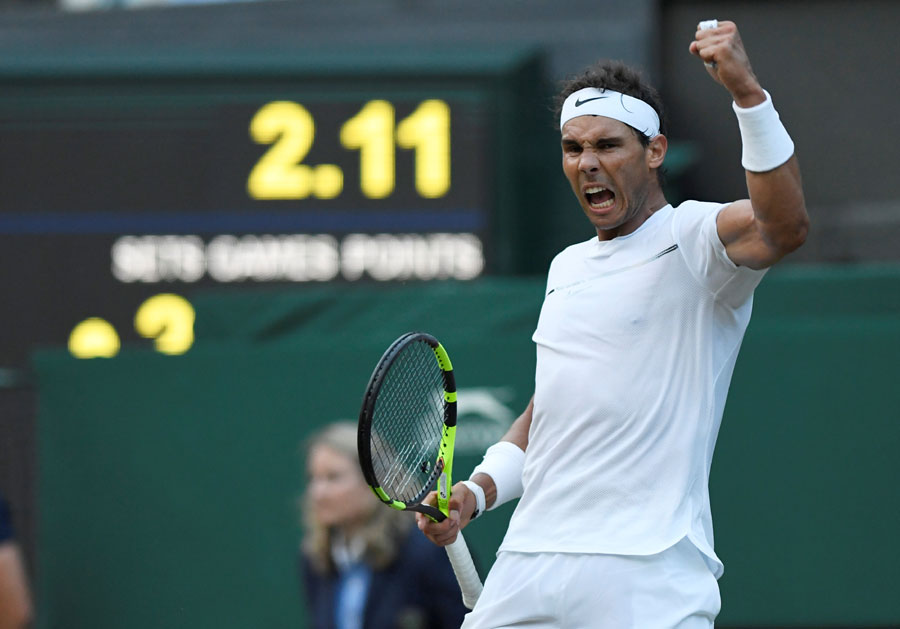 Murray, Nadal reach third round at Wimbledon