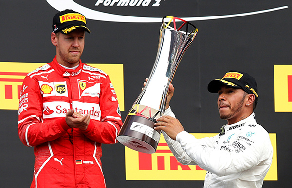 Hamilton holds off Vettel's late move to win Belgian GP
