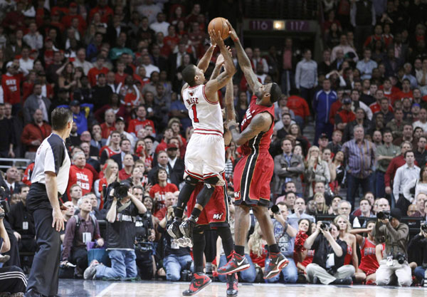 Heat beat Bulls with furious finish, advance to finals