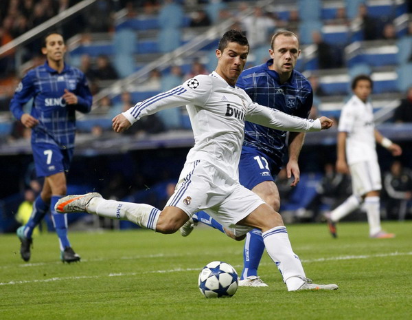 Group leader Real Madrid beats Auxerre 4-0