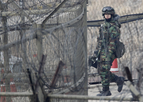ROK soldiers patrol along border