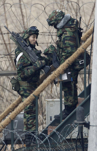 ROK soldiers patrol along border