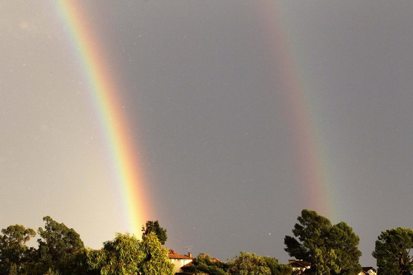 Double rainbow seen during heavy rain in LA
