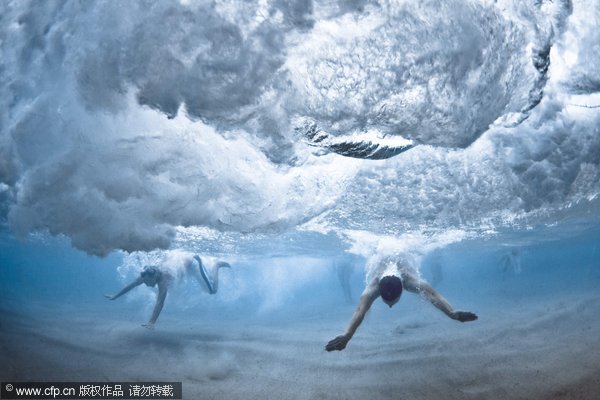 Swimmers battle power of ocean