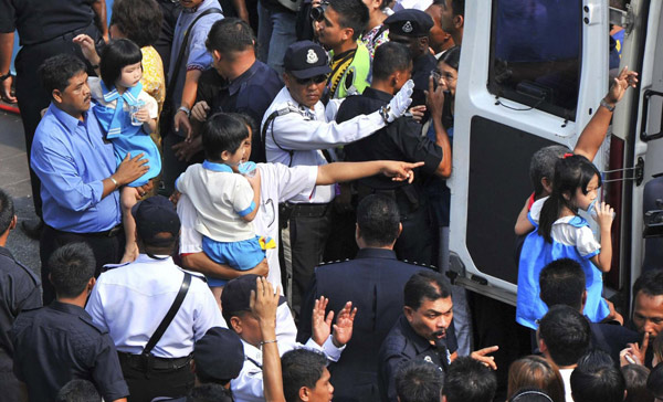 Malaysia police free 30 children held hostage