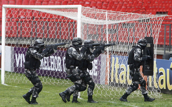 Brazilian riot police take part in a drill