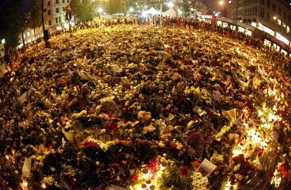 Sea of flowers marks vigil for twin attack victims