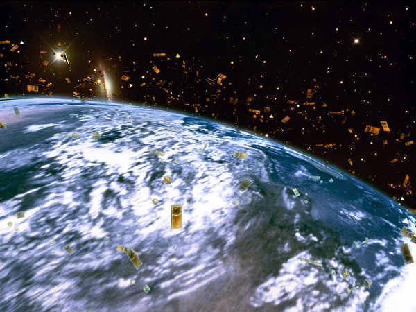 Lifeless satellite falls back to Earth