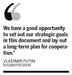 Putin urges cooperation plan with EU ahead of Beijing visit