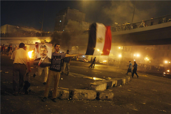 Pro-Morsi protesters, police face off in Cairo