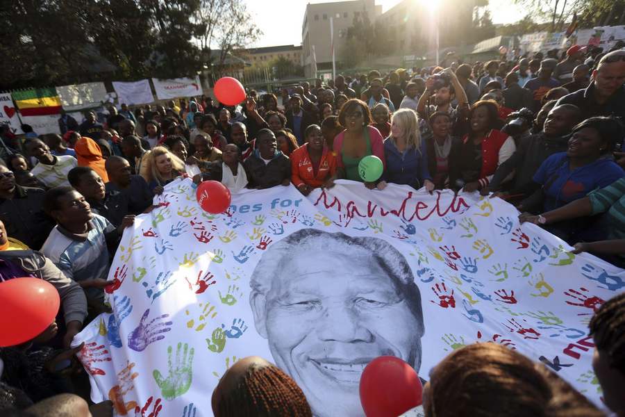 'Improving' Mandela marks 95th birthday