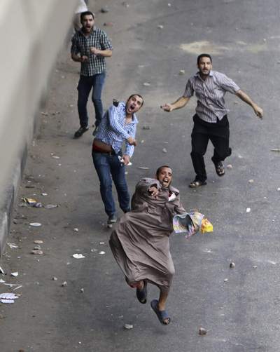 At least 15 killed as Egypt troops storm pro-Morsi camps