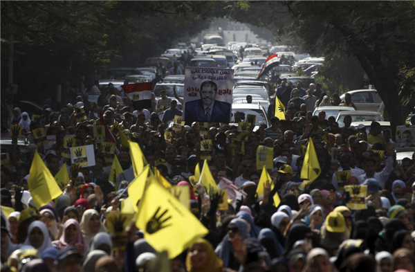 Morsi faces trial in Egypt in test of democracy